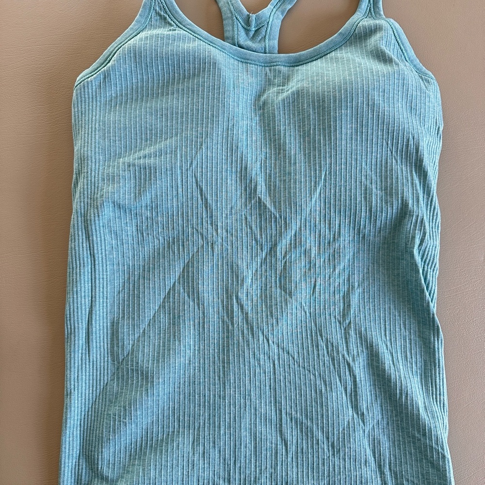 Lululemon athletica size 8 , tidal teal, ebb to street tank.